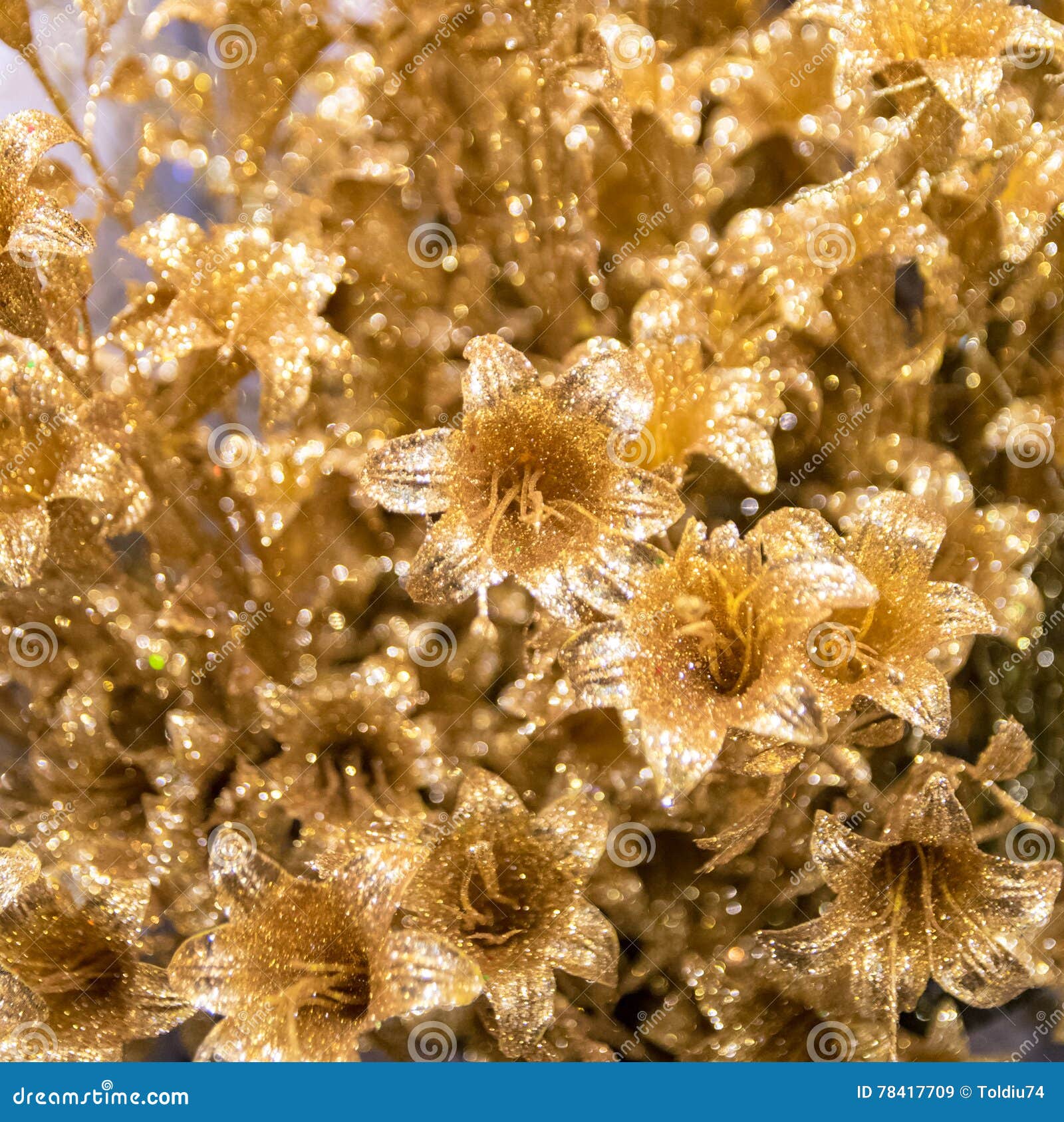 Golden Artificial Flowers for Christmas Decorations. Stock Image
