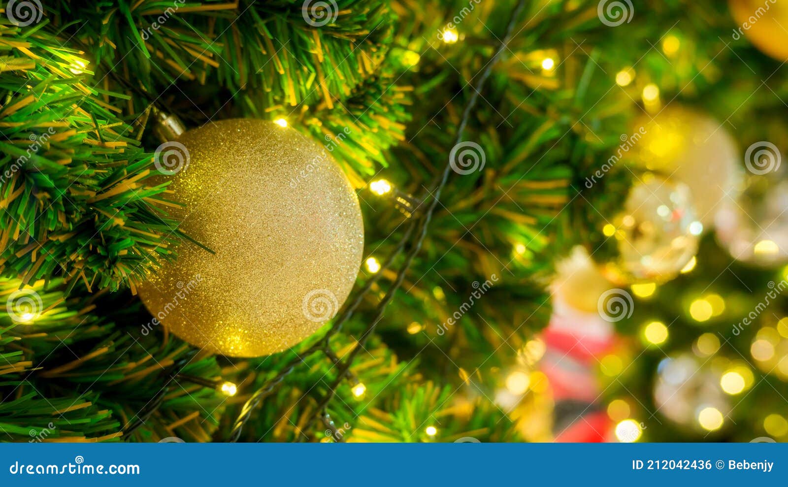 Golden Ball Hanging on a Christmas Tree Stock Photo Image of holiday