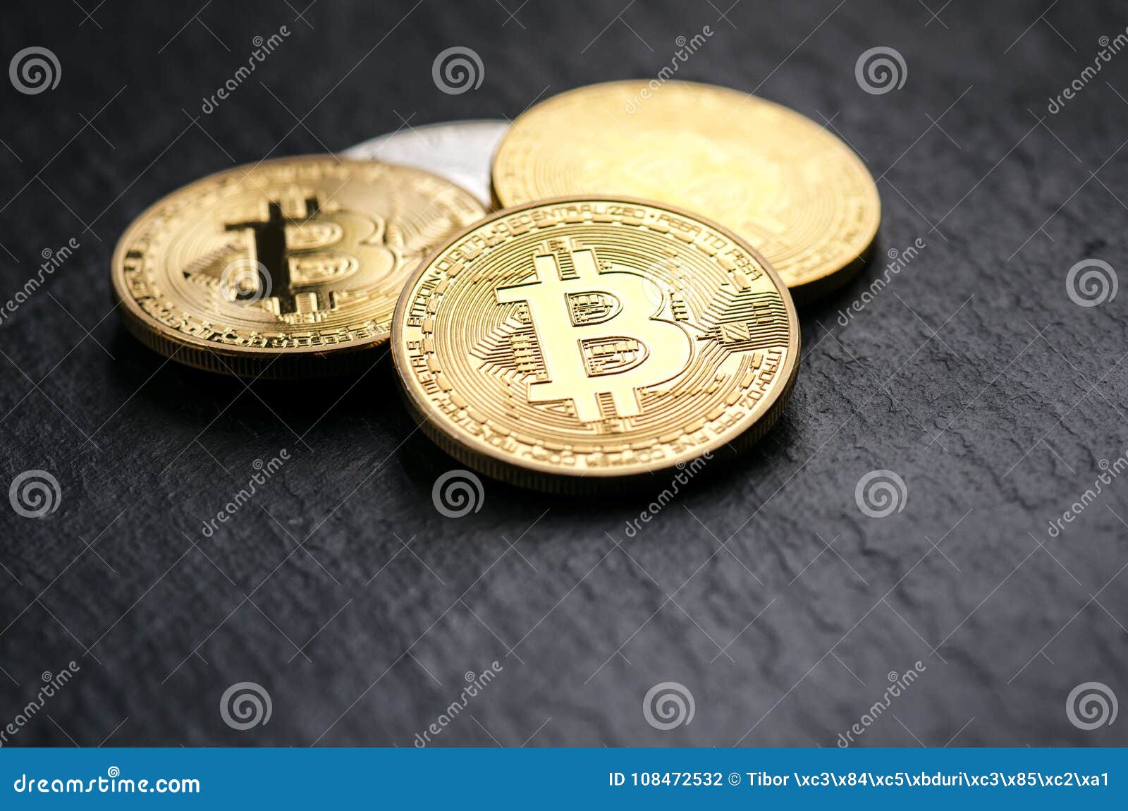 Golden Bitcoin Coins On A Dark Background With Euro Coins ...