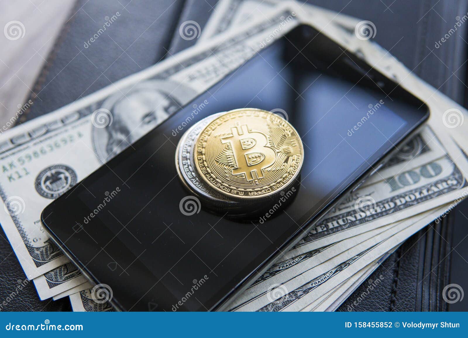 Golden Bitcoins On The Smart Phone And Us Dollars With ...