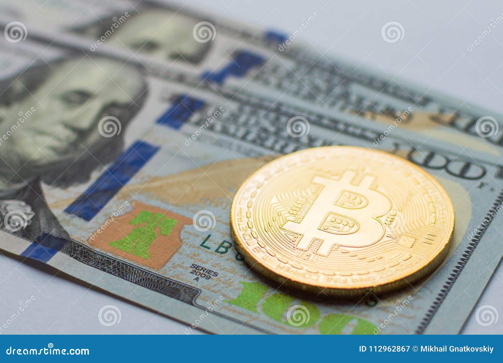 Golden Bitcoins On US Dollars. Digital Currency Close-up ...