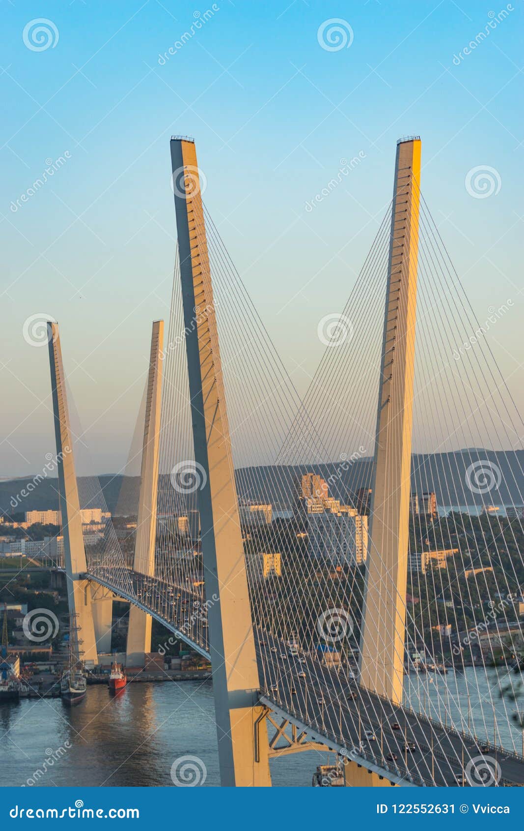 golden bridge is a landmark of the city at sunset.