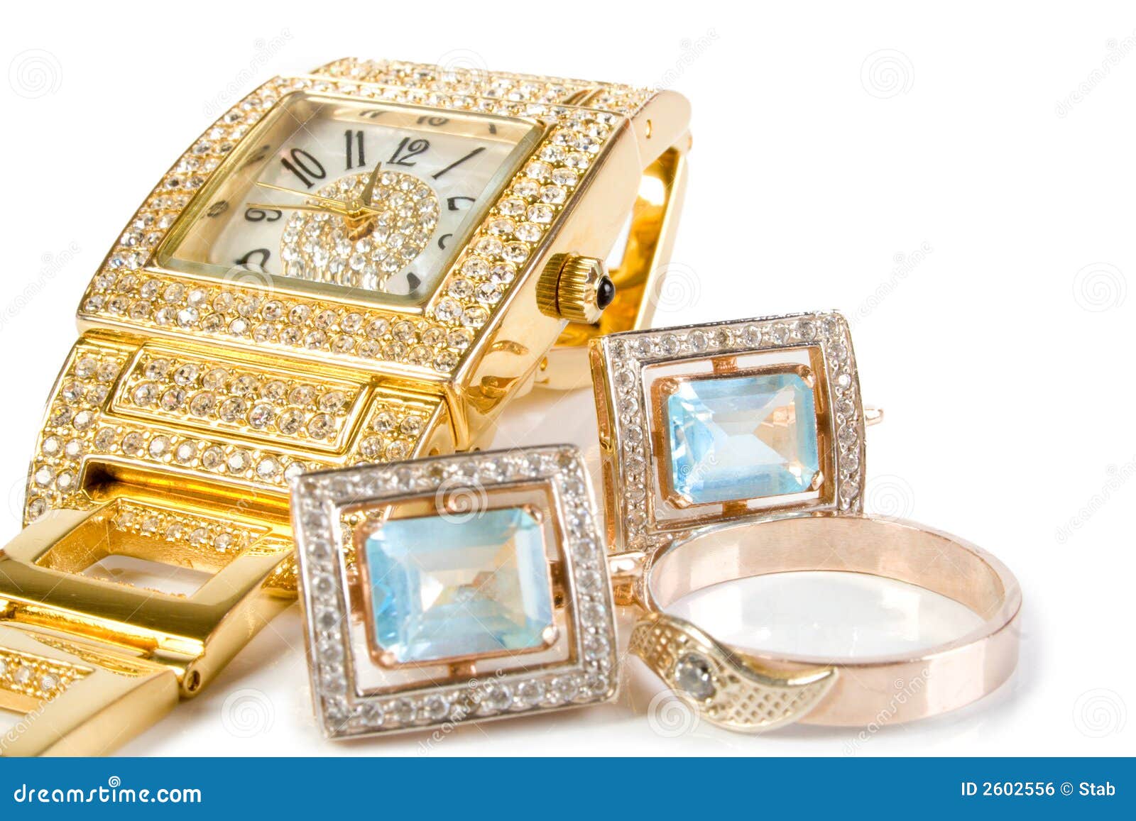 Golden clock and jewellery stock photo. Image of diamond 2602556