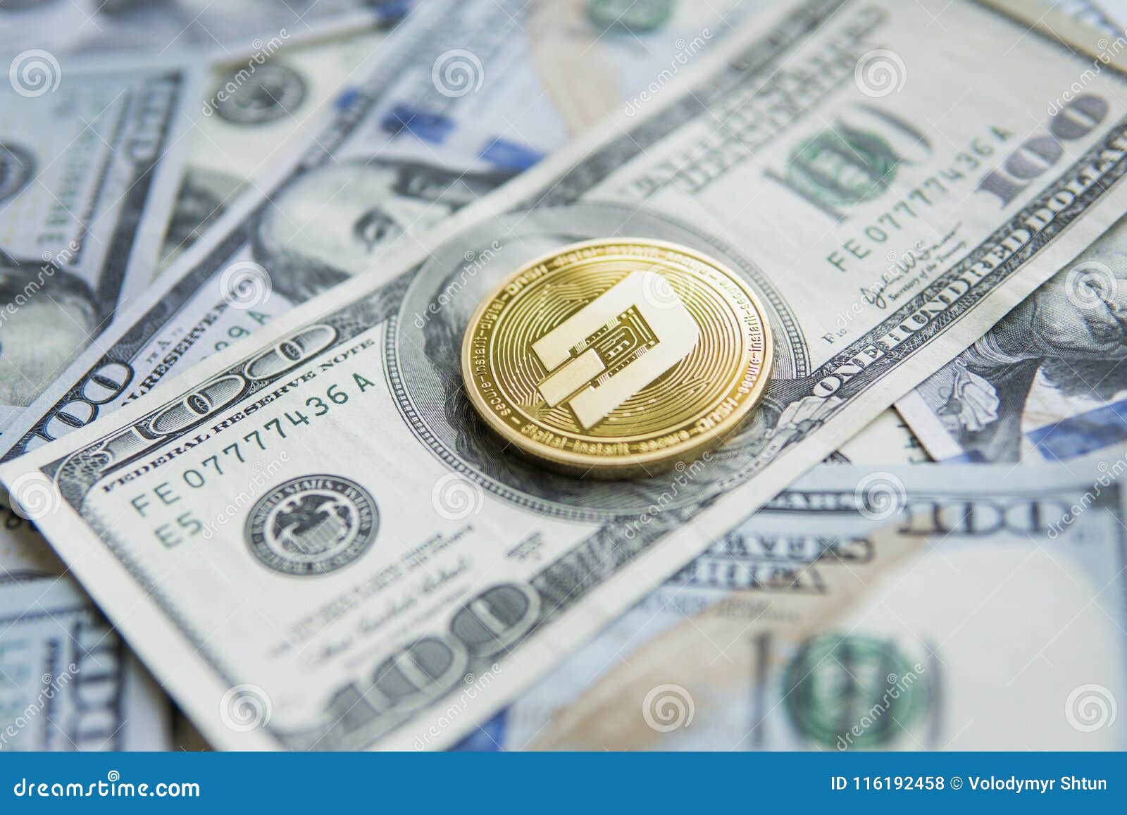 Golden Dash Cryptocurrency Coin On A Pile Of US Dollars ...