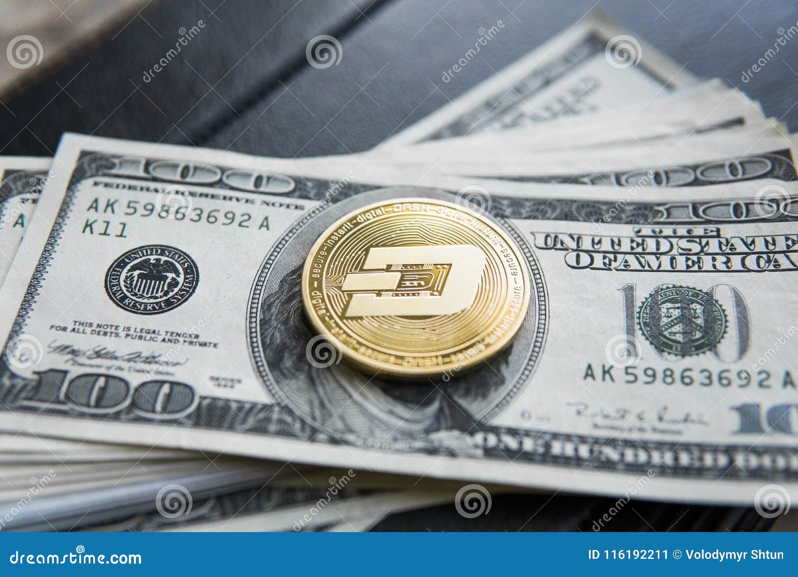 Golden Dash Cryptocurrency Coin On A Pile Of US Dollars ...