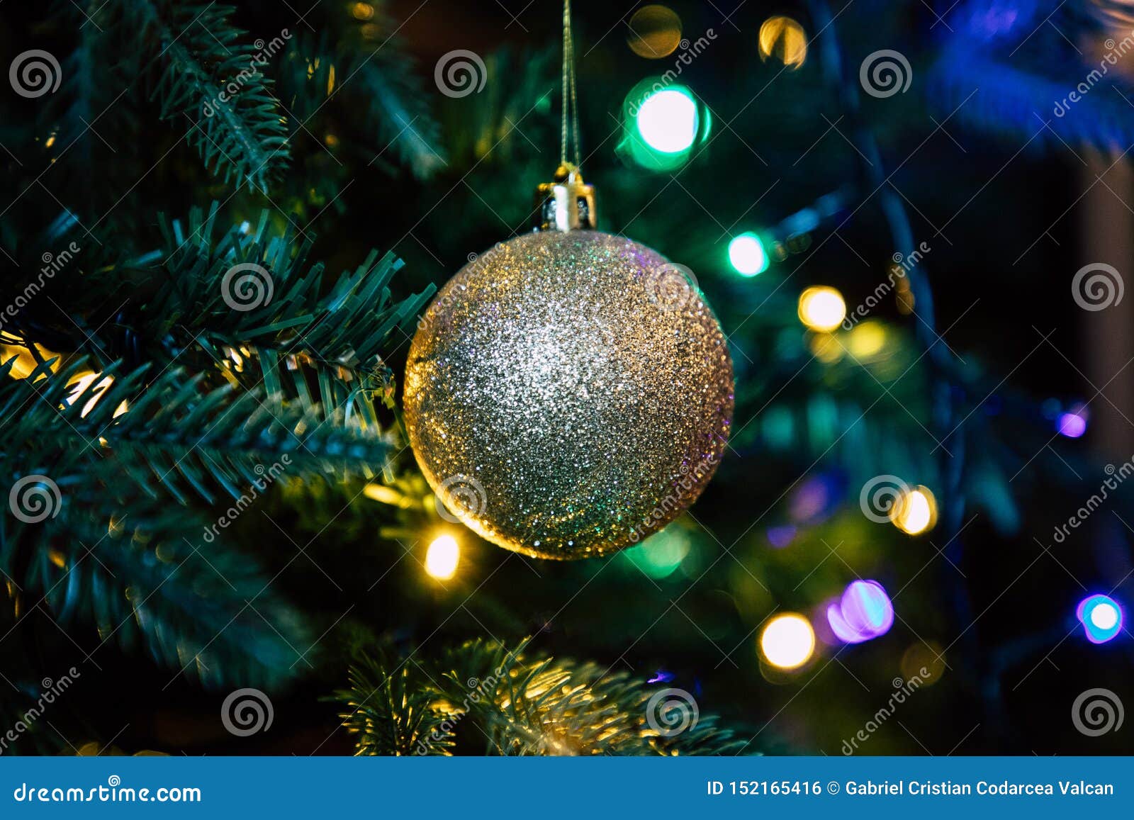 Golden Decoration Globe on Christmas Tree Close Up Stock Photo - Image ...