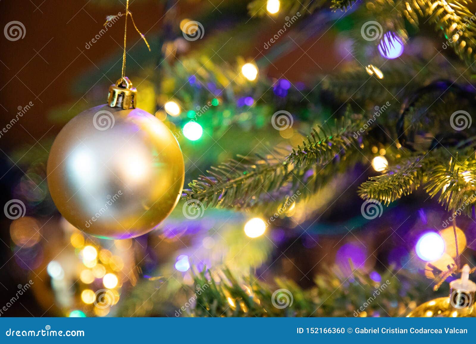 Golden Decoration Globe on Christmas Tree Close Up Stock Photo - Image ...