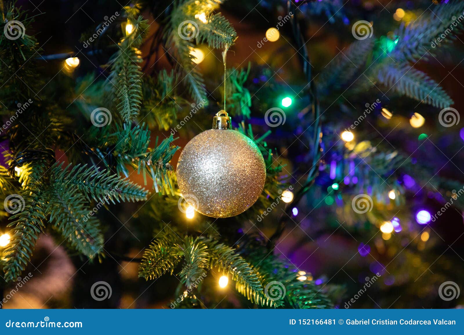 Golden Decoration Globe on Christmas Tree Close Up Stock Image - Image ...