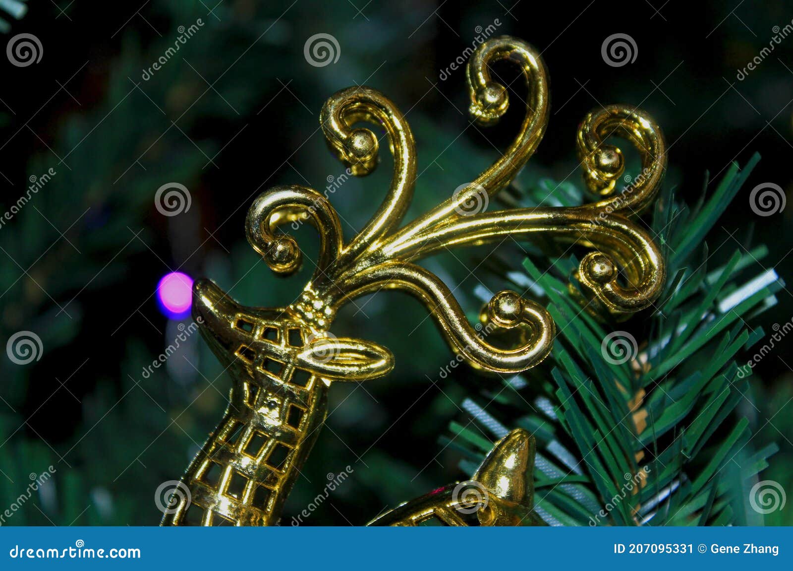a golden deer in christmas tree
