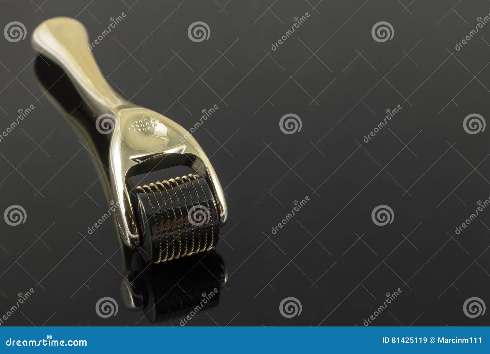 golden derma roller for medical micro needling therapy.