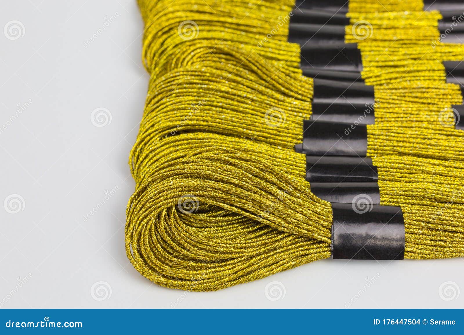Golden embroidery thread stock photo. Image of hobby 176447504