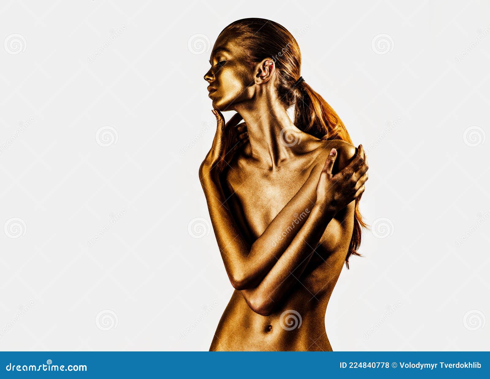 Golden Female Body of Young Beautiful Woman with Bare Chest and