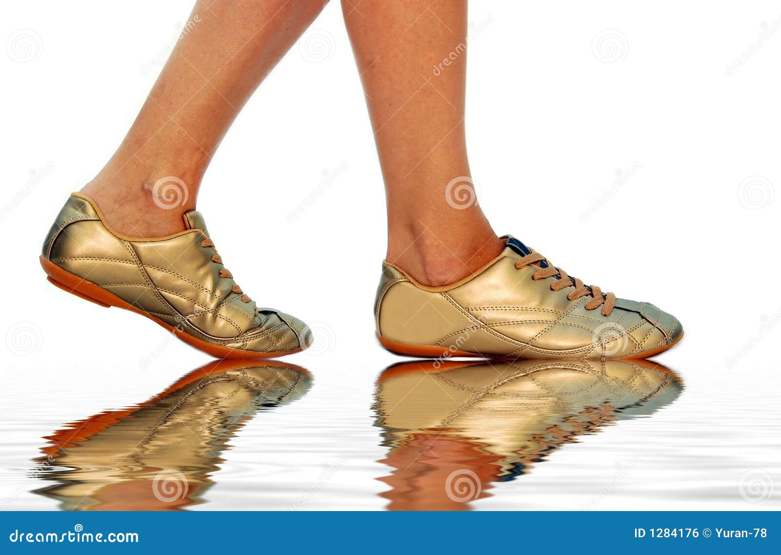 Golden footwear stock photo. Image of speed, gold, female 1284176
