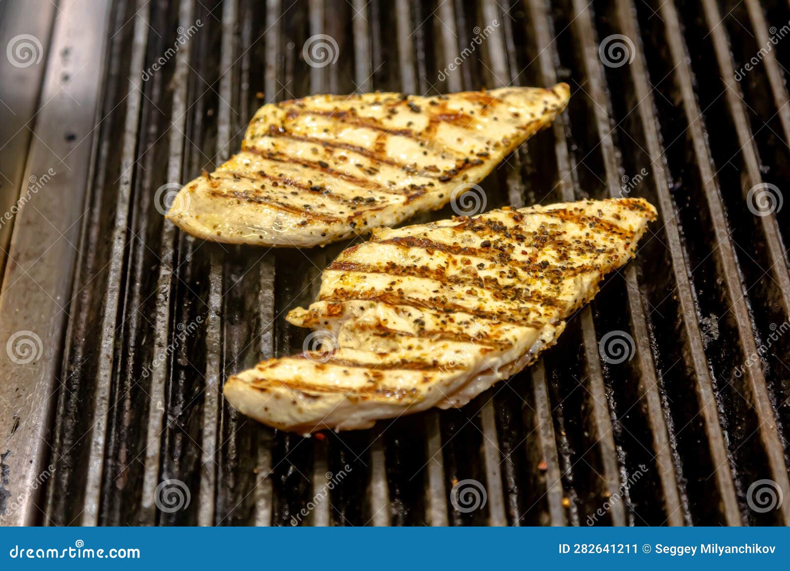 Golden Fried Pieces of Chicken Breast in a Griddle Stock Image Image