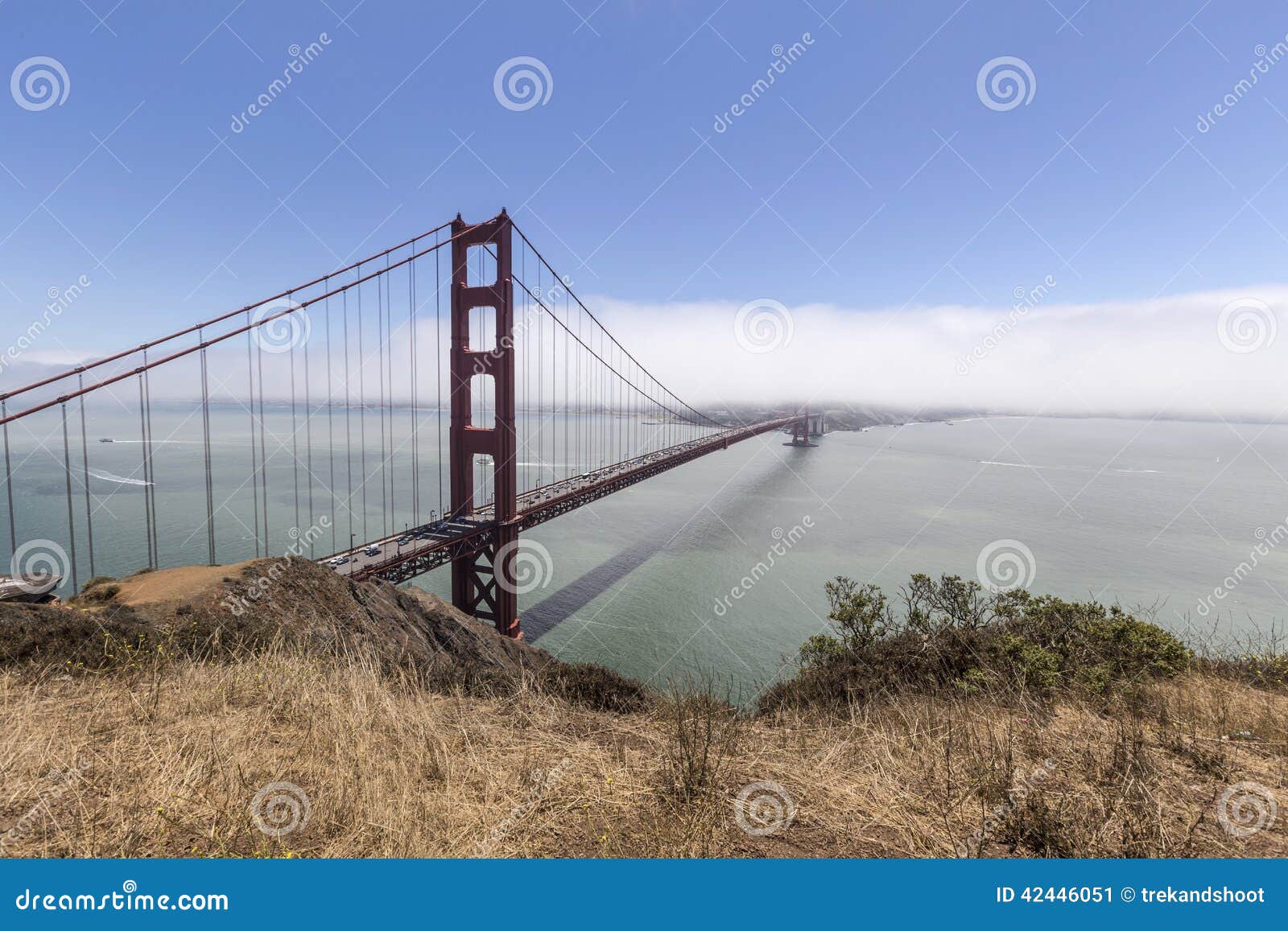 Golden Gate Fog Bank. San Francisco s Golden Gate bridge leading to seasonal summer fog bank.