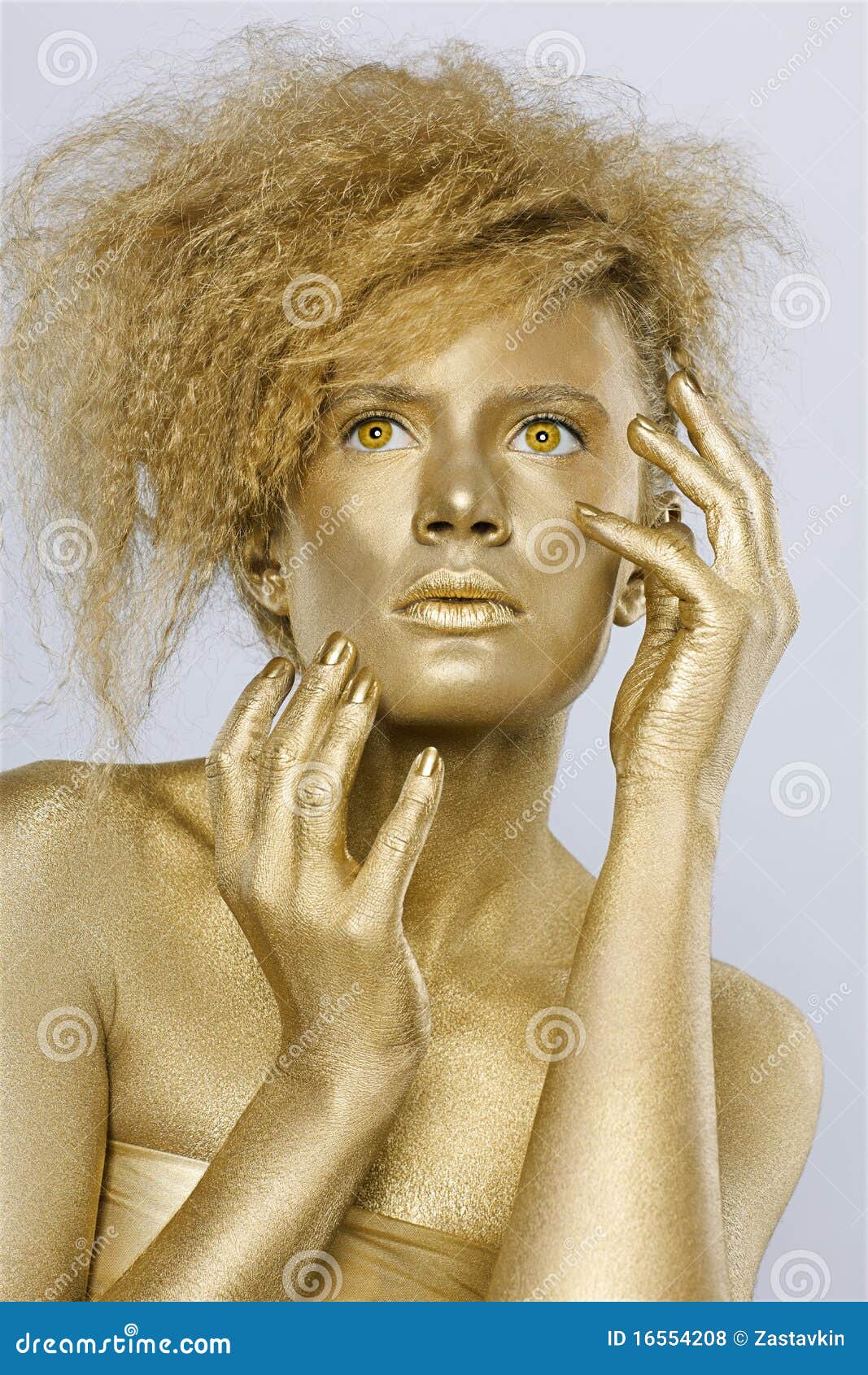 Golden girl stock photo. Image of expression, hand, jewelry 16554208