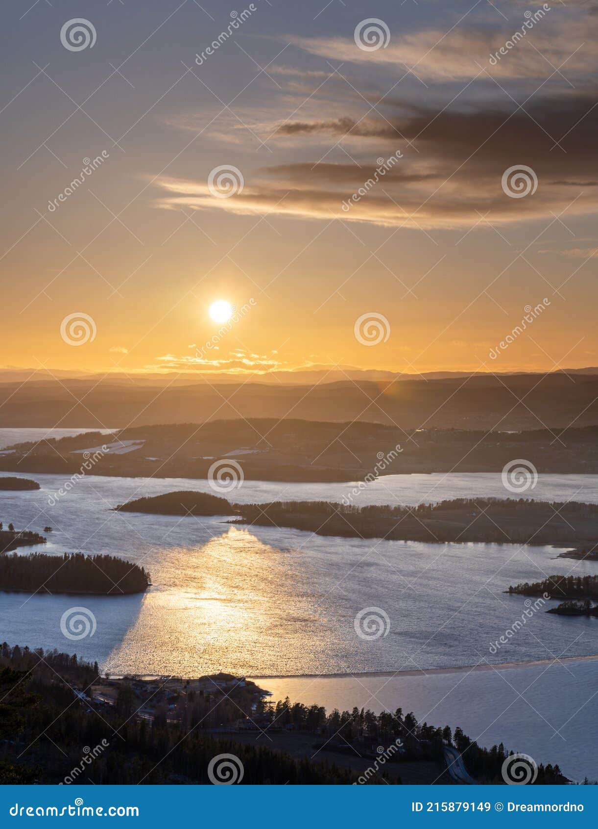 golden hour over steinsfjorden, a branch of lake tyrifjorden located in buskerud, norway. view from kongens utsikt royal view at