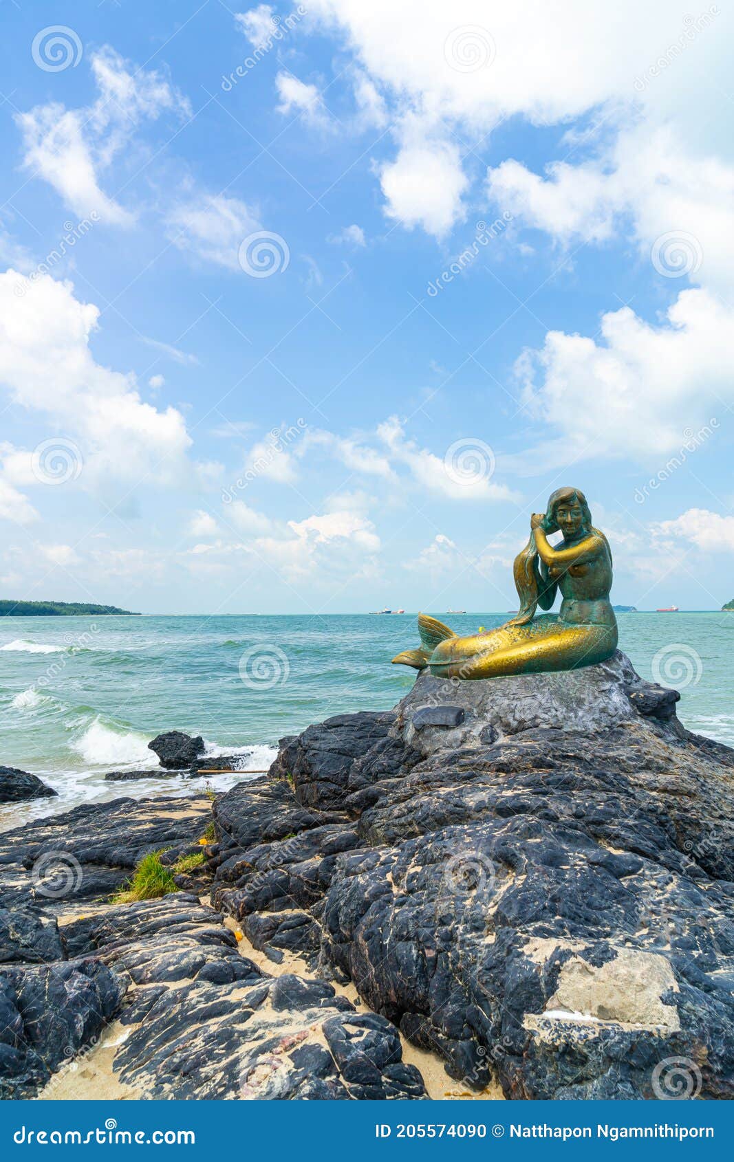 golden mermaid statues on samila beach. landmark of songkla, thailand