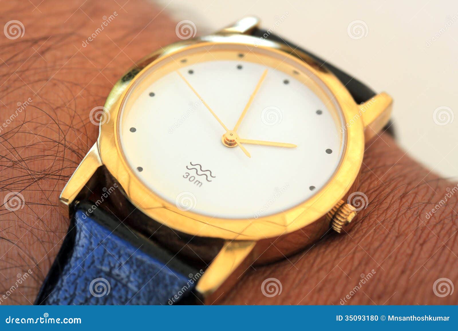 Golden Modern Wrist Watch Showing Time As 2pm Stock Photo - Image of ...