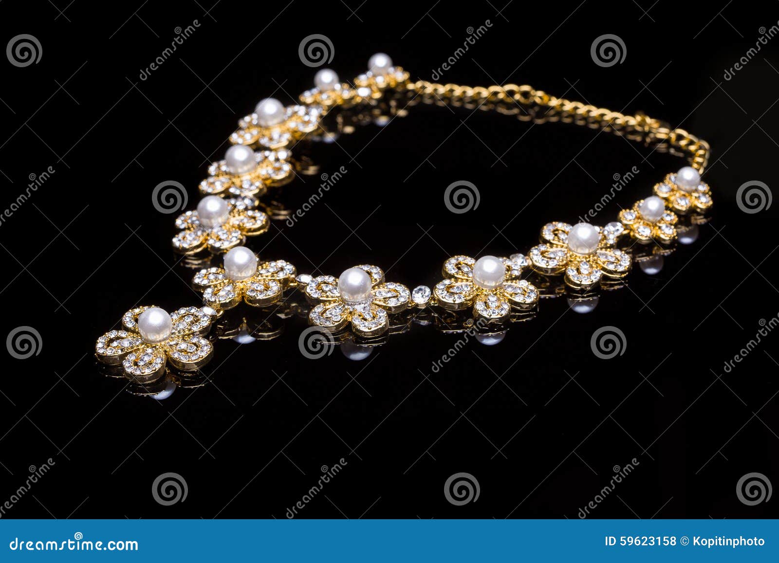 Golden necklace stock photo. Image of gold, black, beautiful 59623158