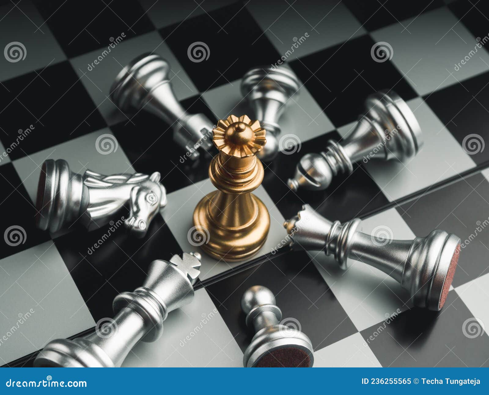 The gold horse, knight chess piece standing with falling silver pawn chess  pieces on chessboard on white background with copy space. Leadership,  winner, competition, and business strategy concept. Photos