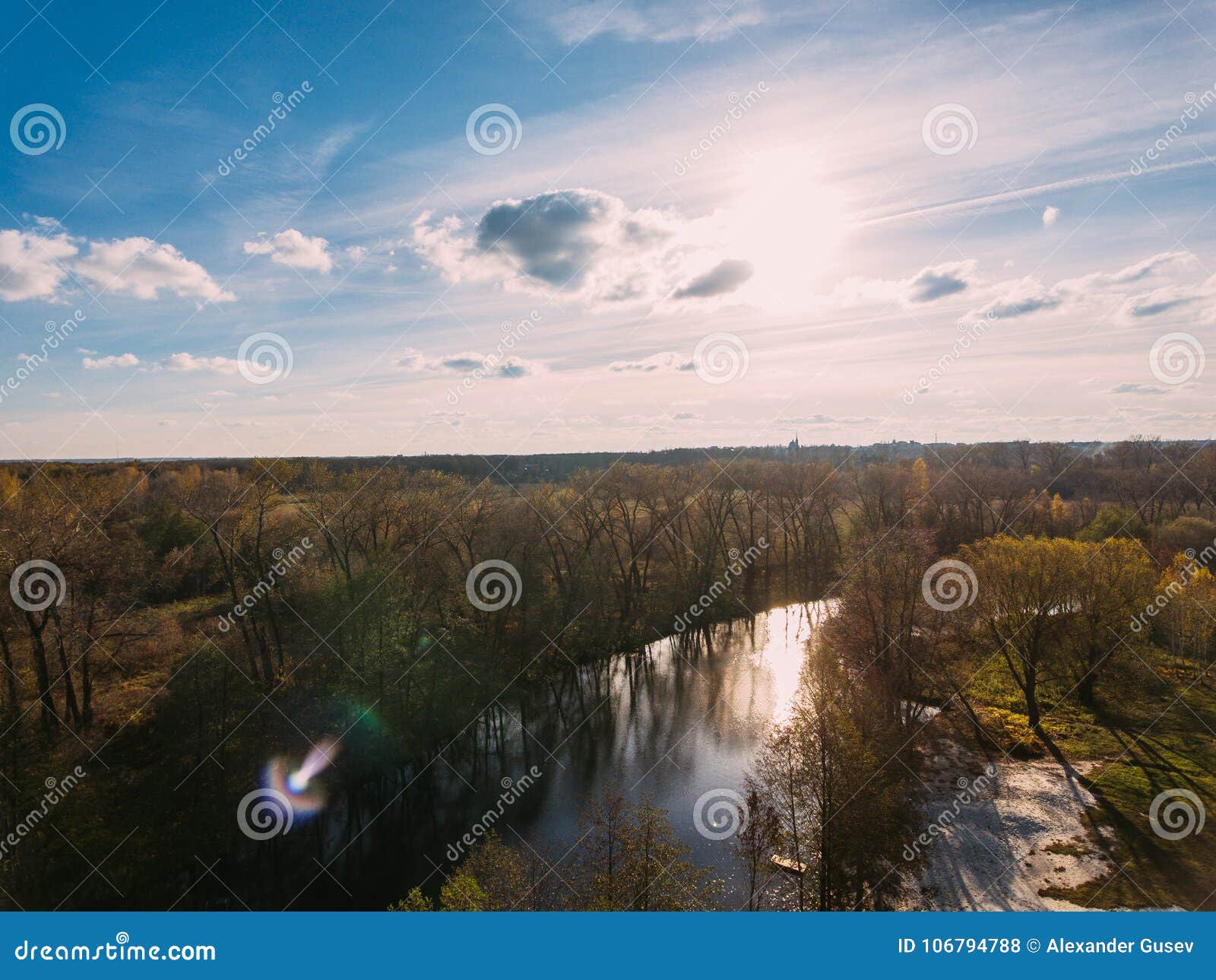 golden red sunlight aerial view, russia, river, small town, bridge