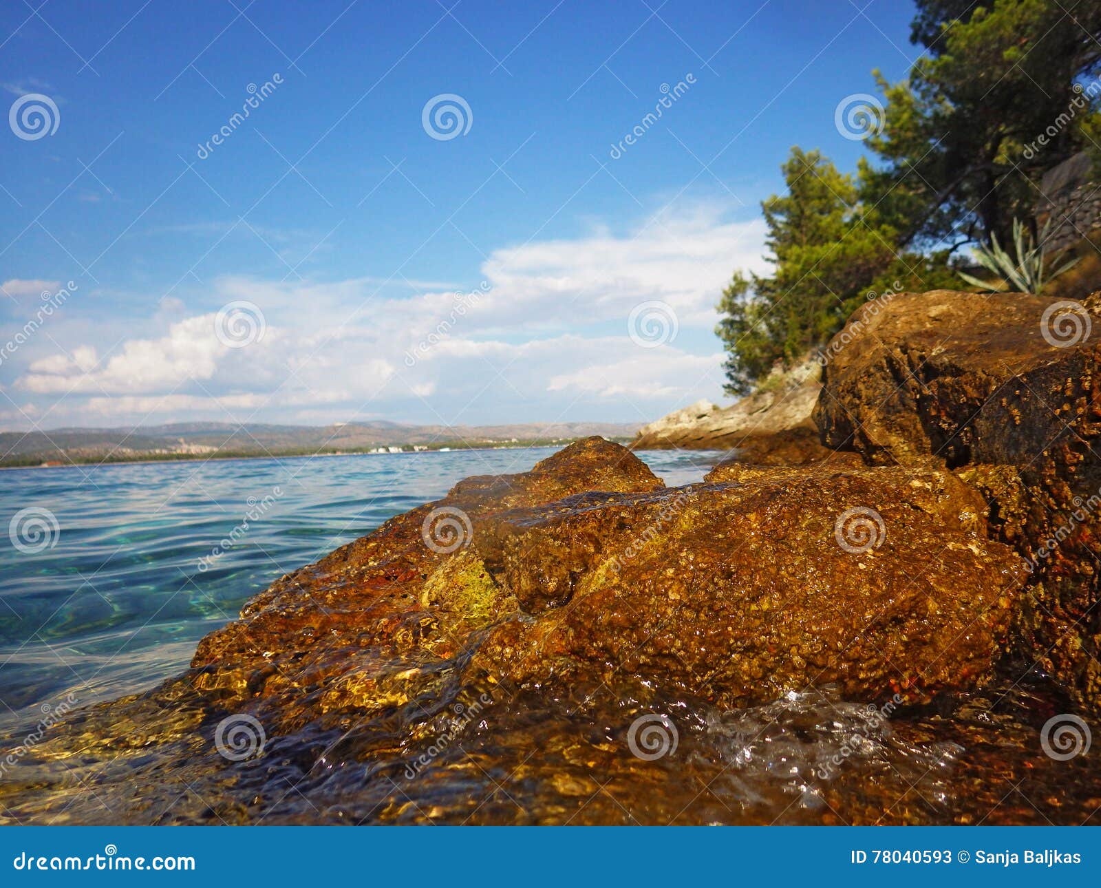 Golden rock near the sea stock image. Image of europe - 78040593