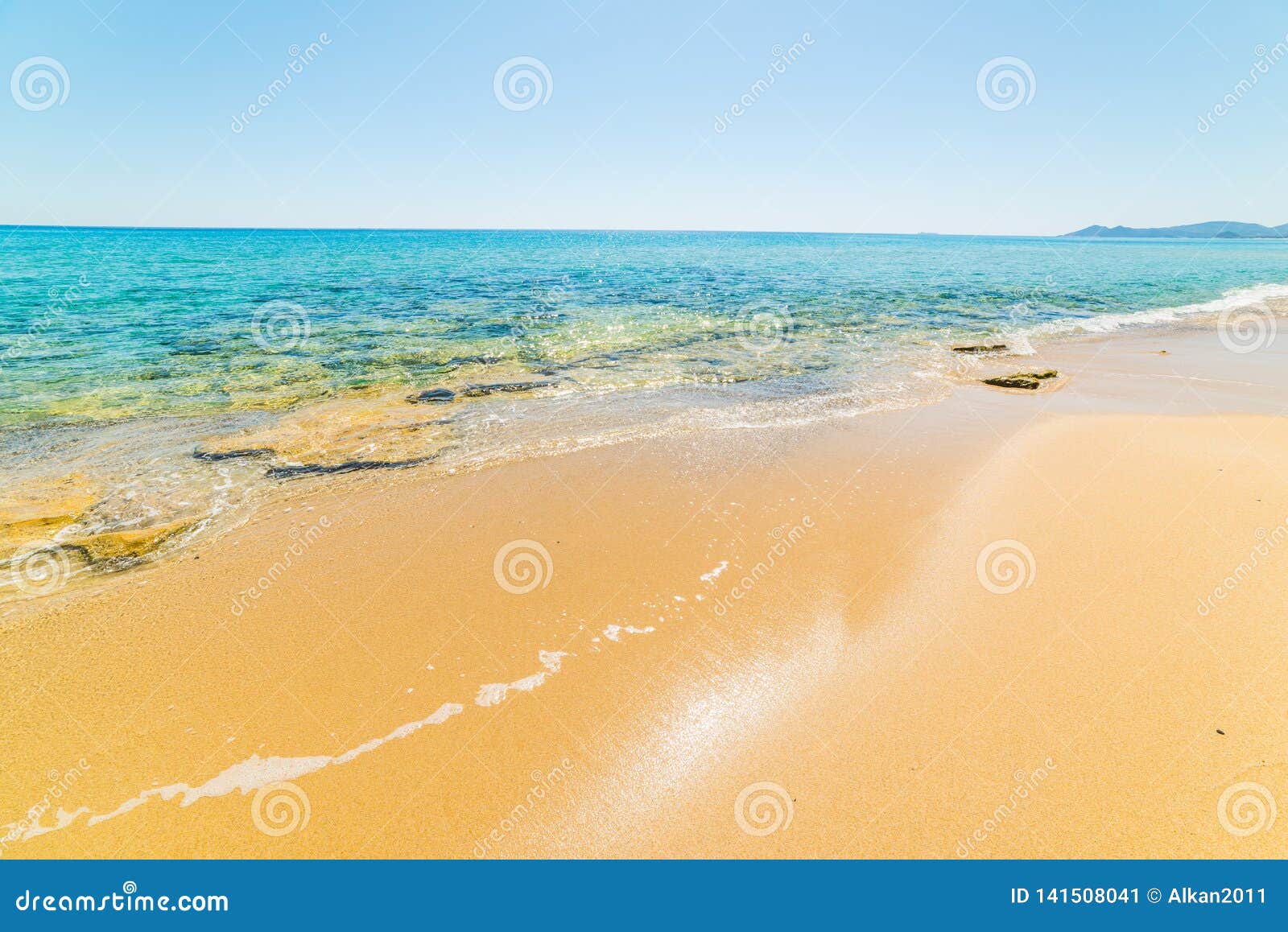 golden sand and clear water in piscina rei