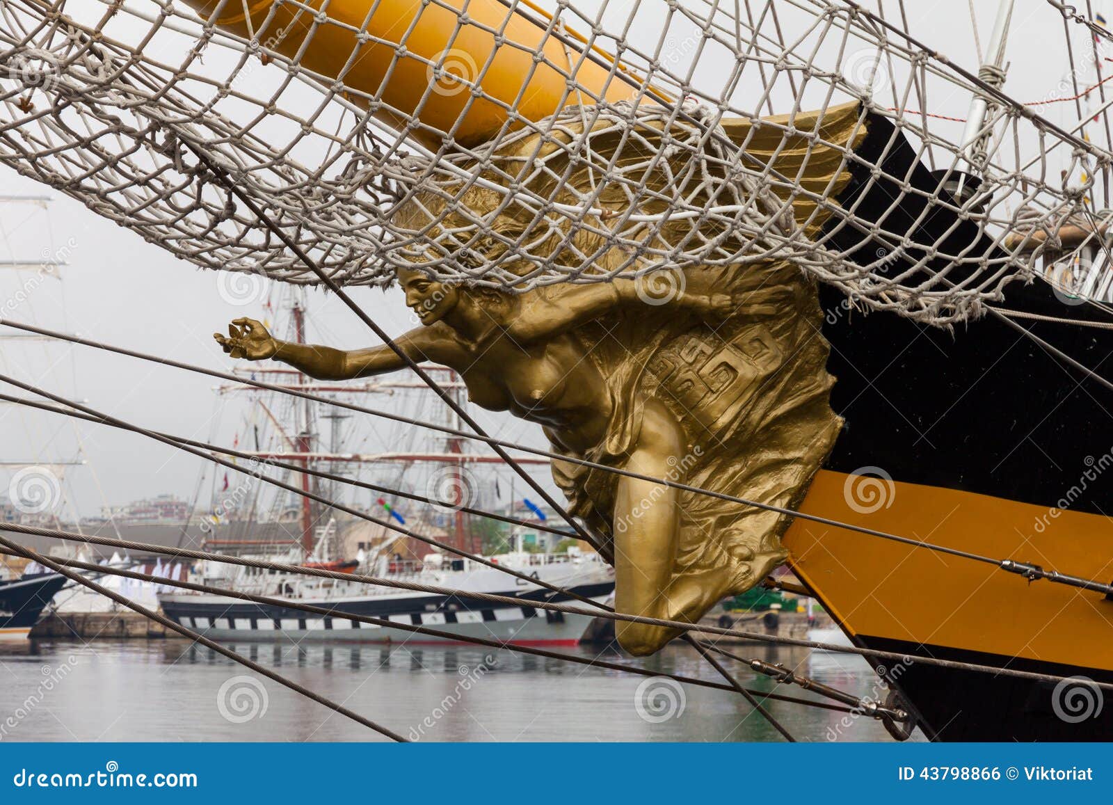 Golden Statue On The Bow Of A Ship Stock Photo - Image of 