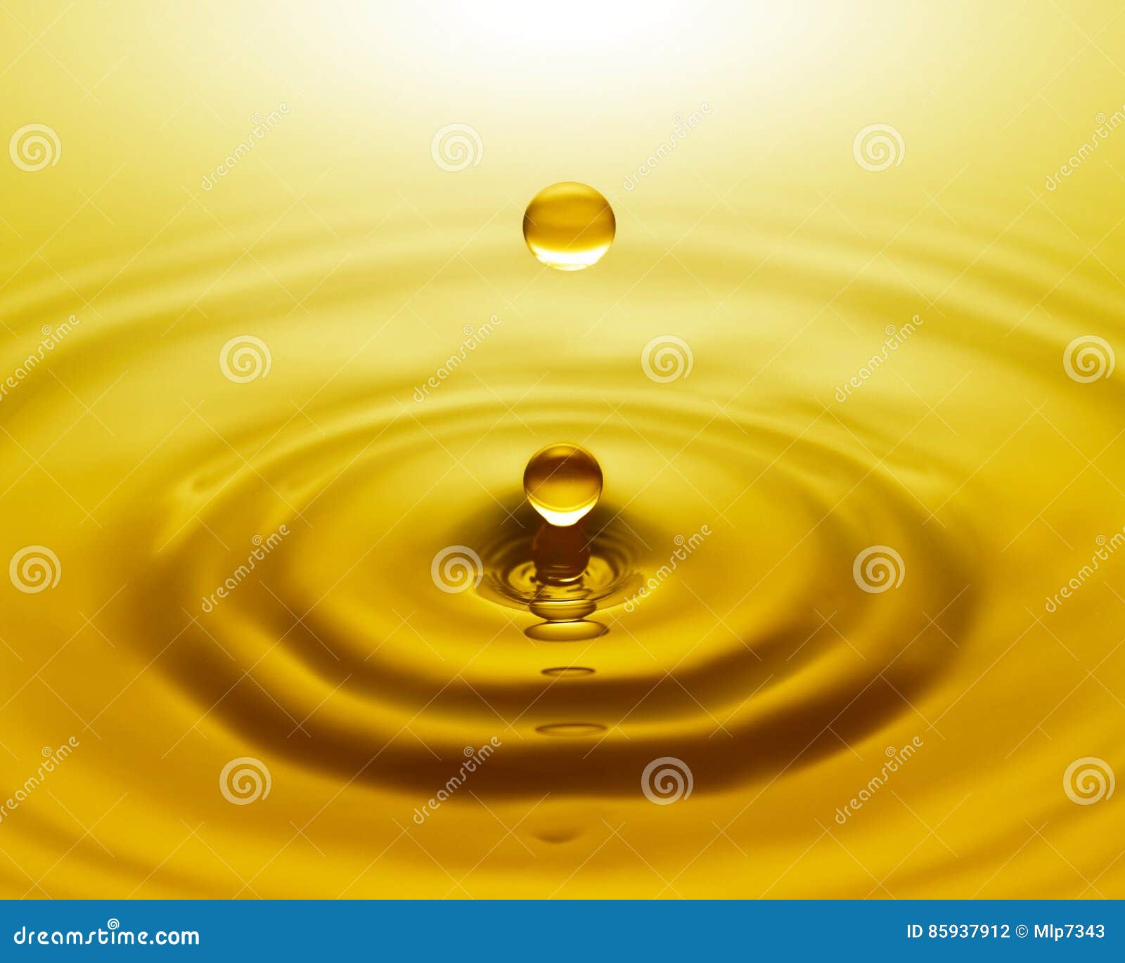 Golden water drop stock photo. Image of shape, calm, horizon - 85937912