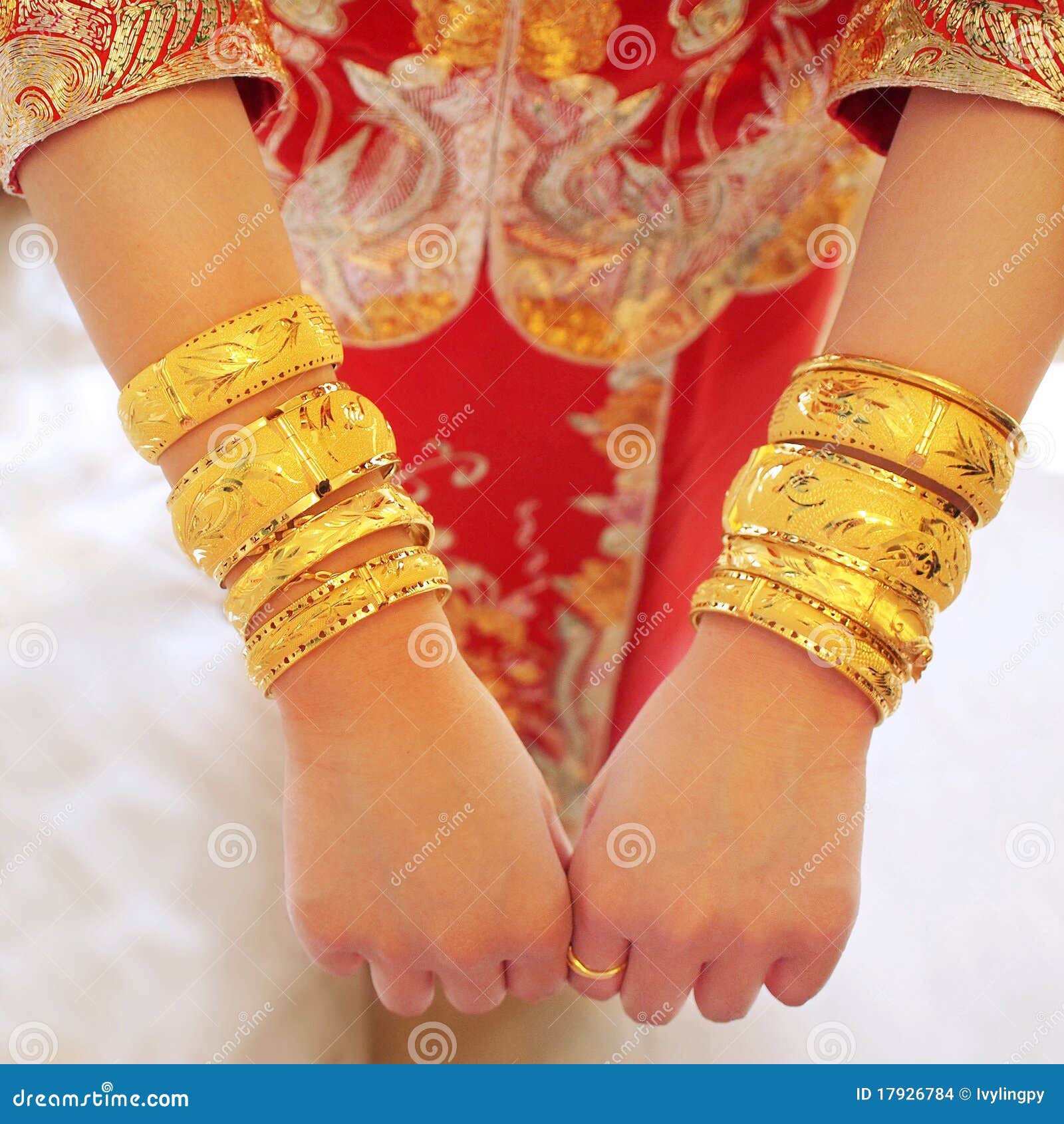 Golden wedding bangles stock photo. Image of expensive - 17926784