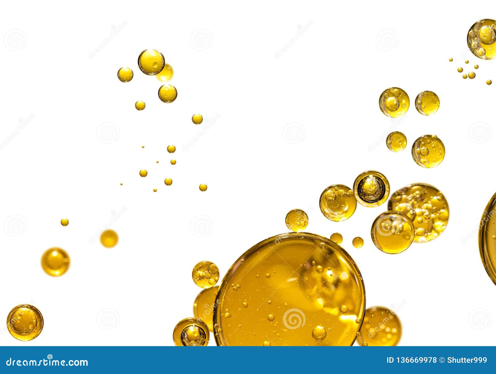 Golden yellow bubble oil stock photo. Image of shiny 136669978
