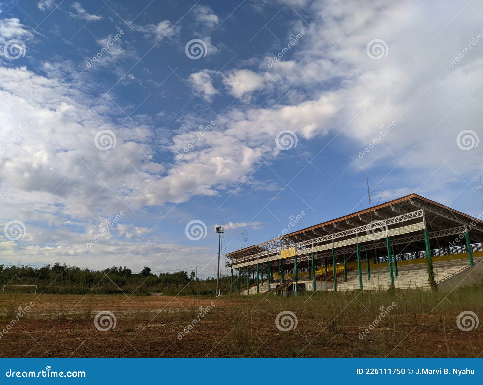 goldenhour photography of local stadion in borneo city