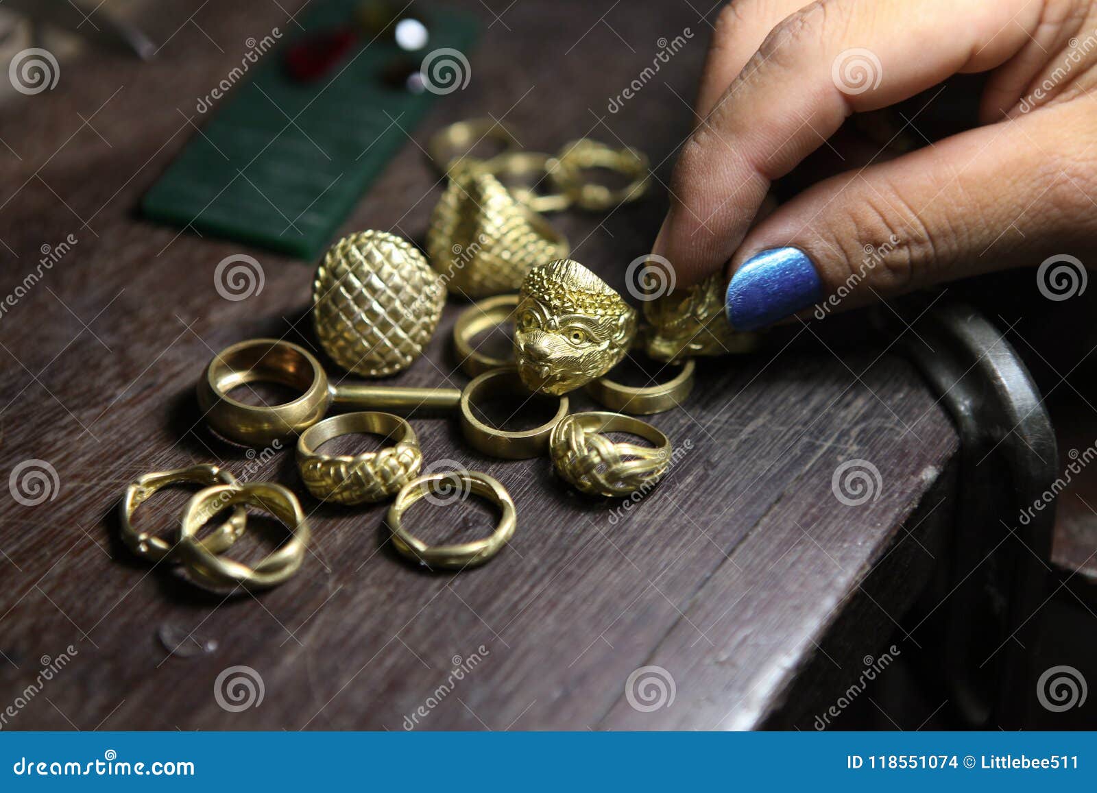 goldsmith checking ring after casting.