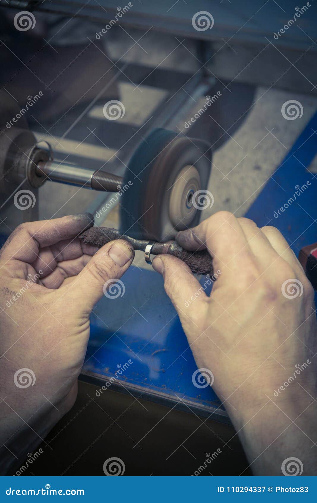 Goldsmith Working on Wedding Ring. Polishing Process. Stock Image