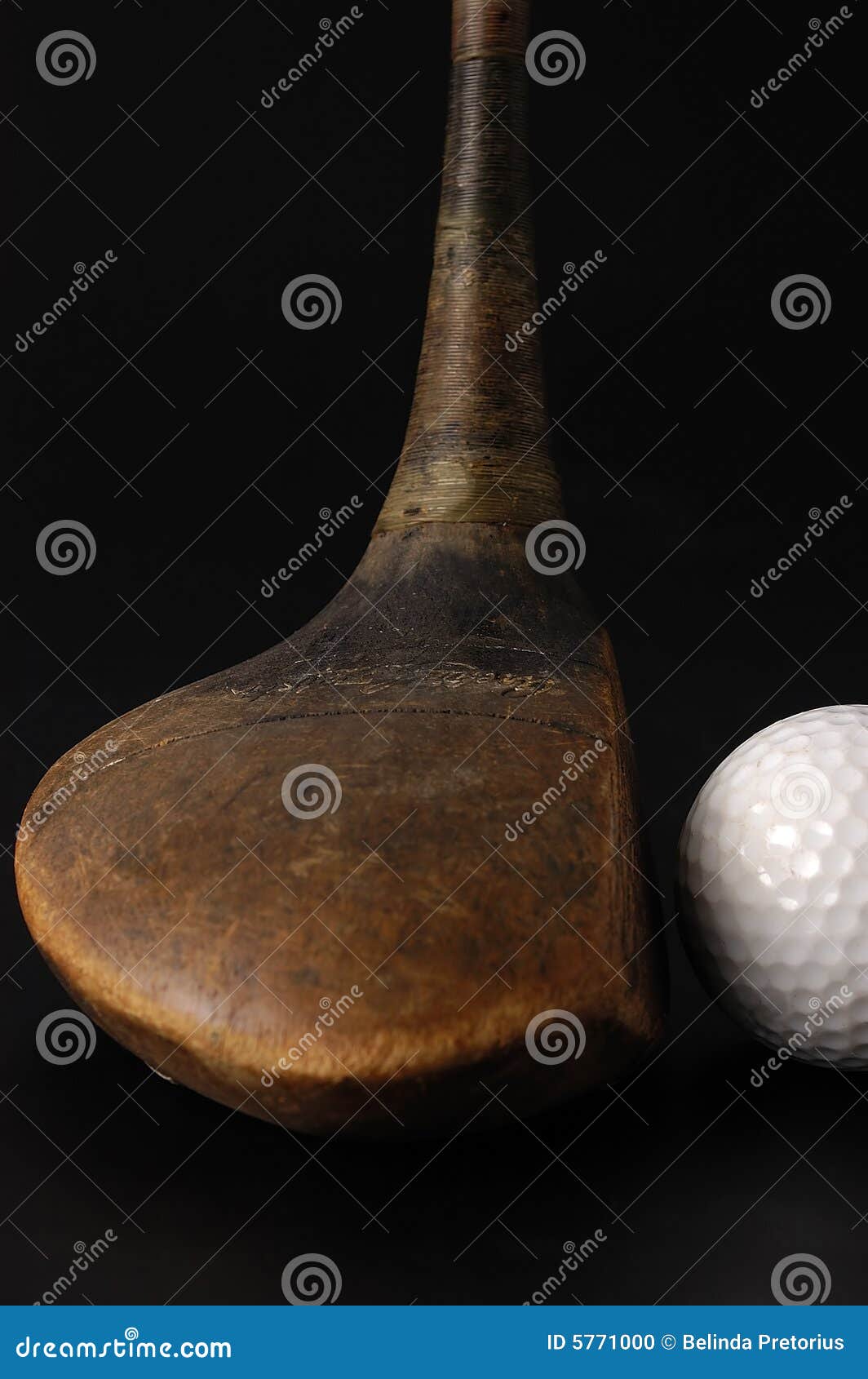 A Golf Ball and Club on a Black Background Stock Photo - Image of putt