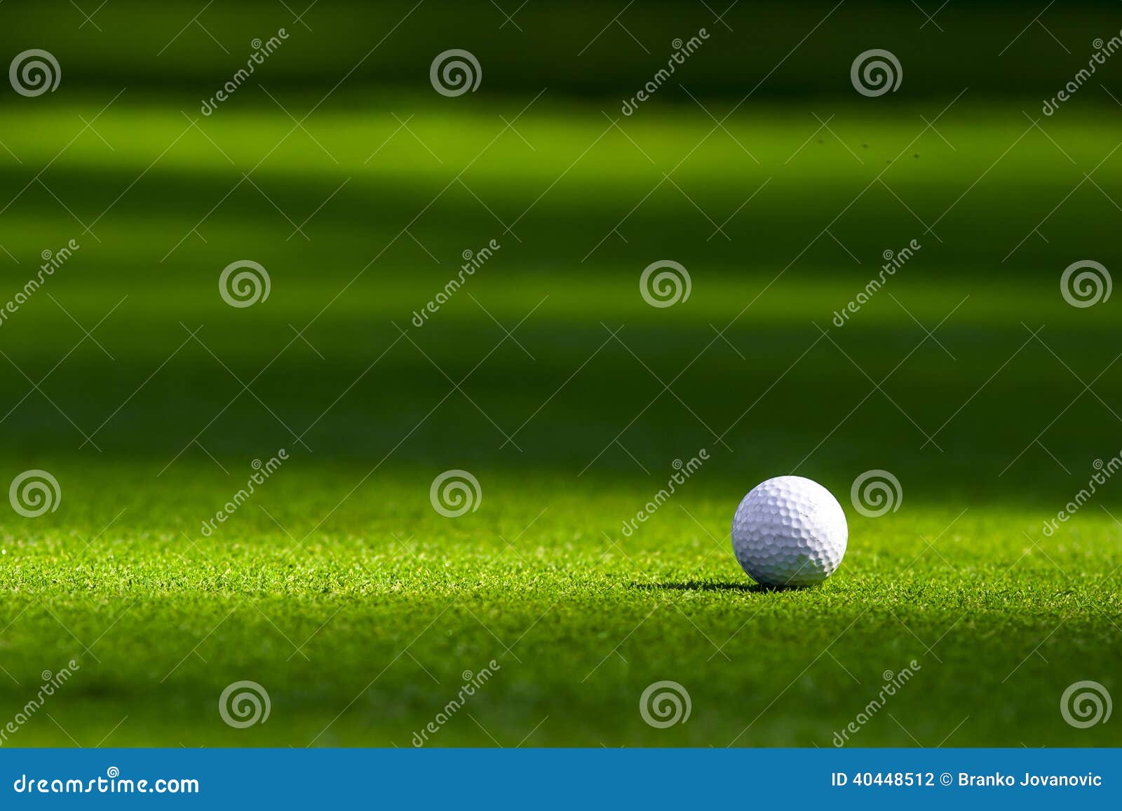 Golf ball on the green stock photo. Image of background 40448512