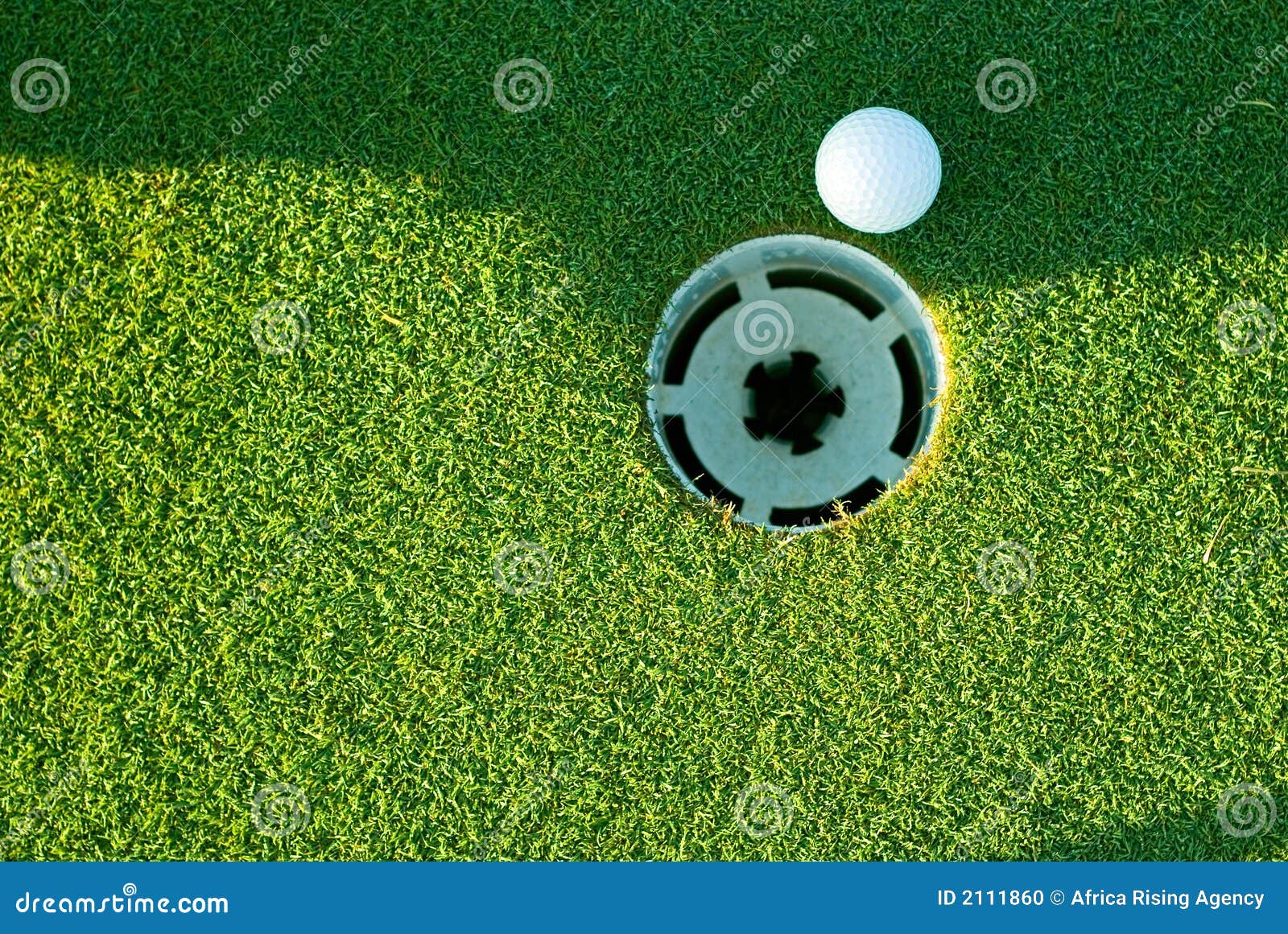 Golf ball and hole stock photo. Image of golf, leisure 2111860