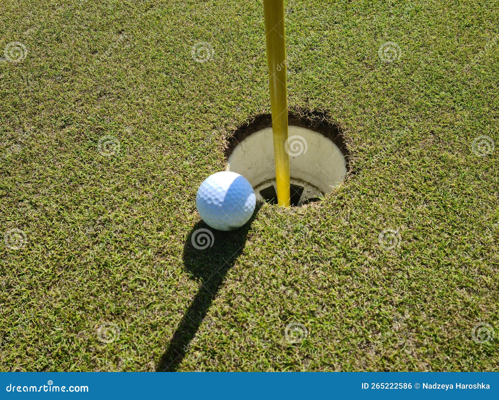 Golf Ball in the Hole on the Golf Course Stock Photo Image of object
