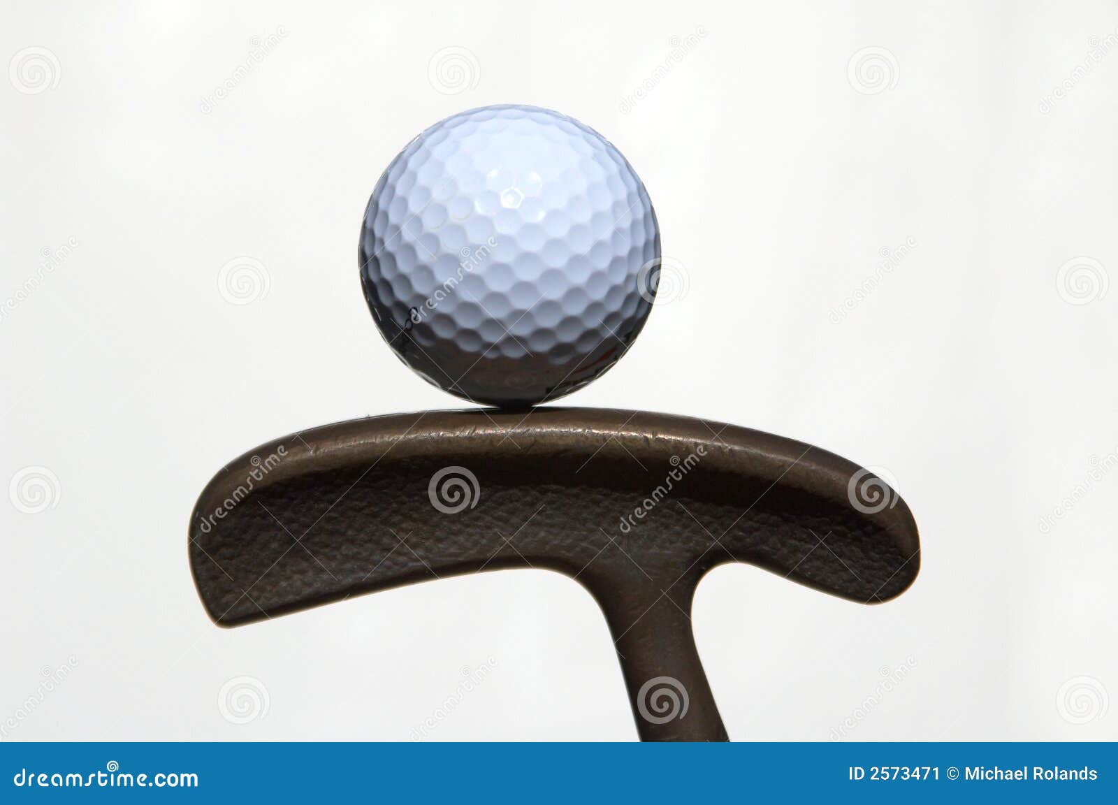 golf ball and putter