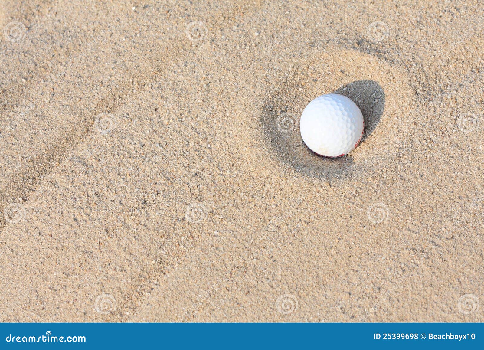 golf ball on sand