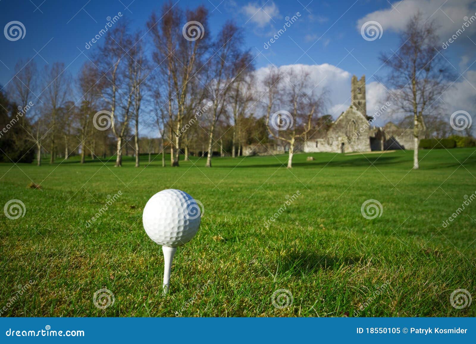 Golf ball on the tee - idyllic golf course of irish Adare