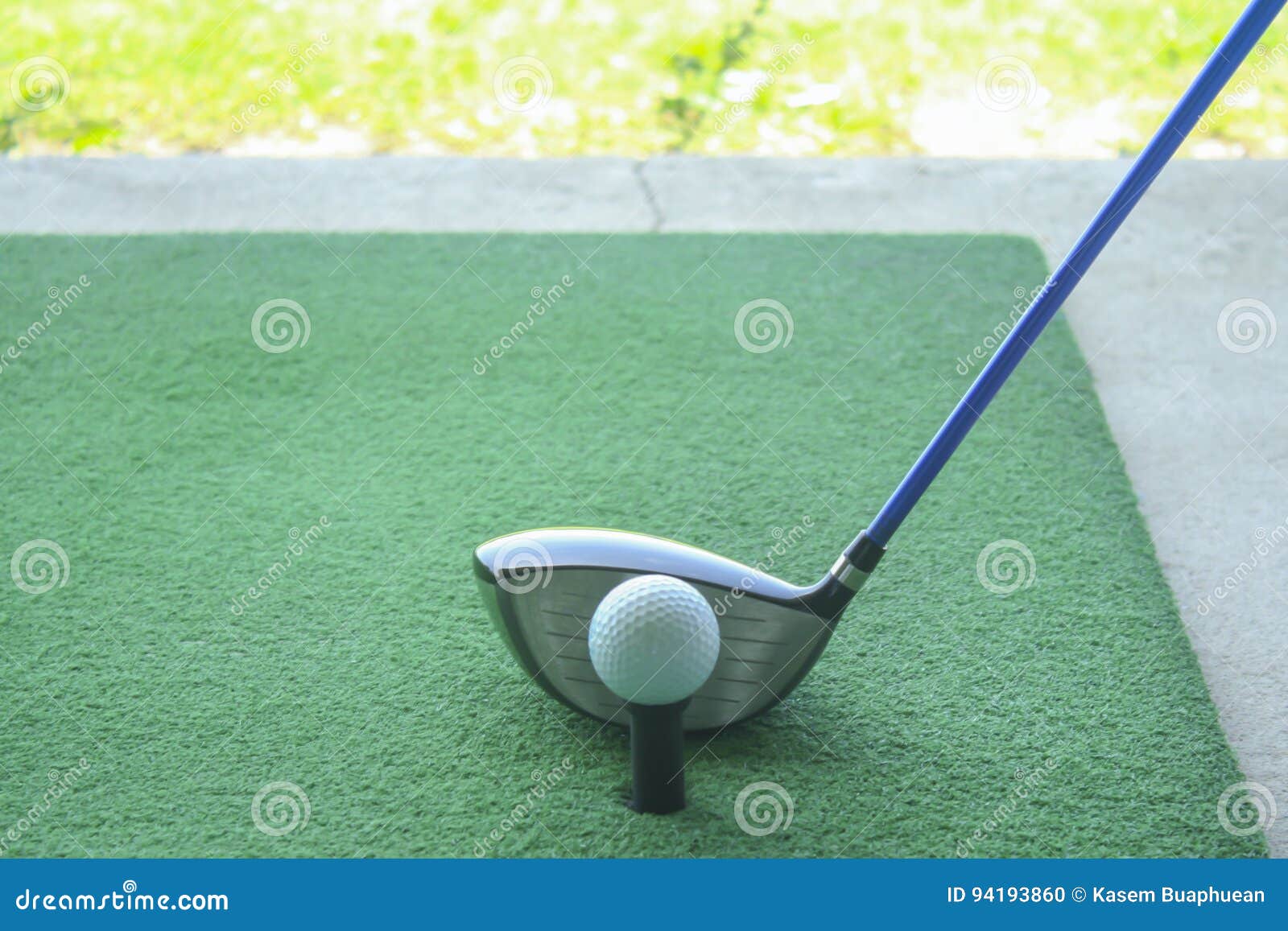 golf ball on tee with driver club, in front of driver, driving r