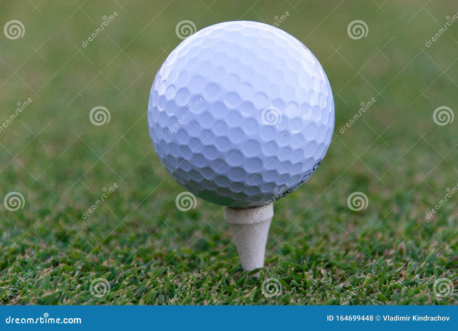 Golf Ball on Tee Pegs Ready To Play in the Golf Course Stock Photo
