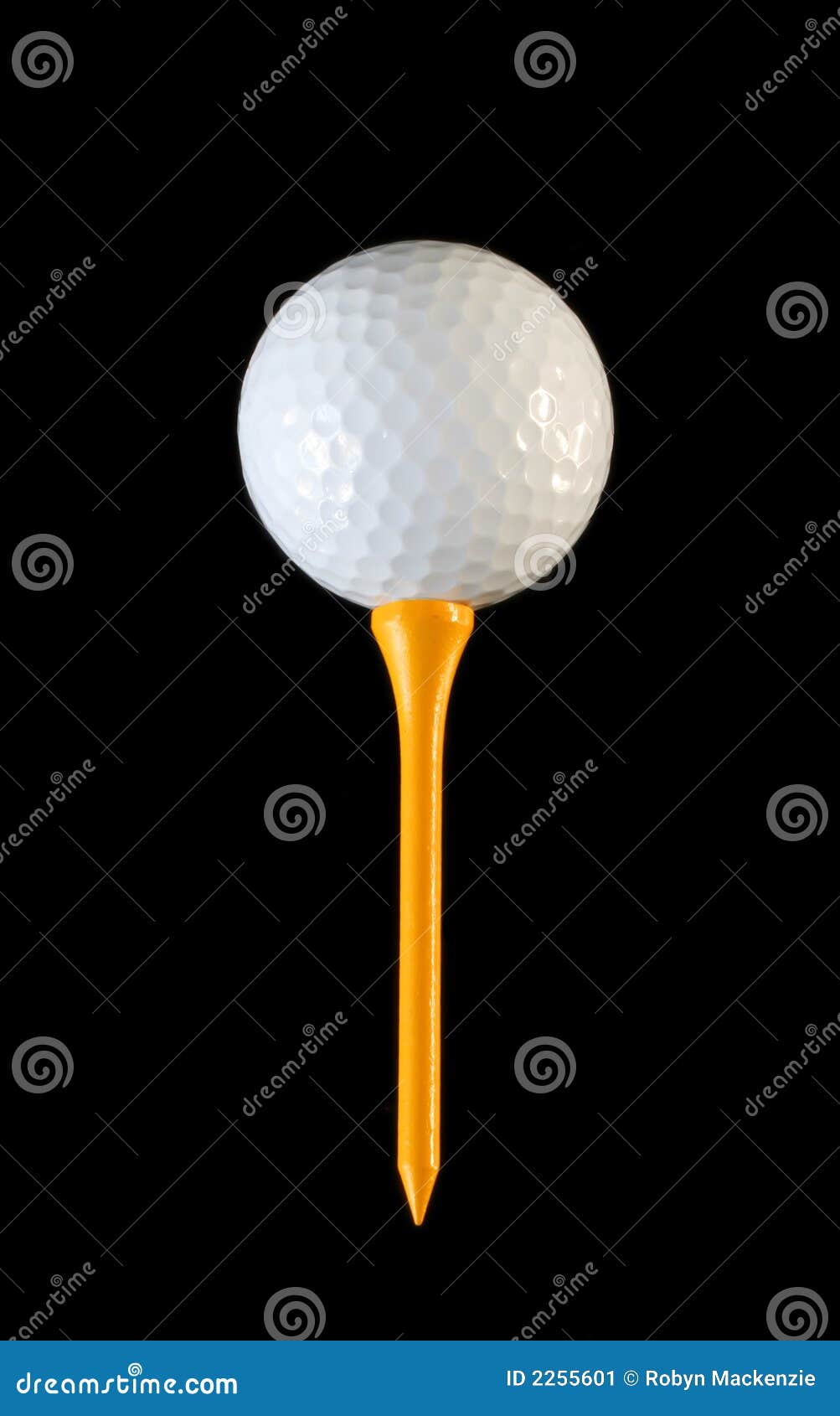 golf ball on yellow tee
