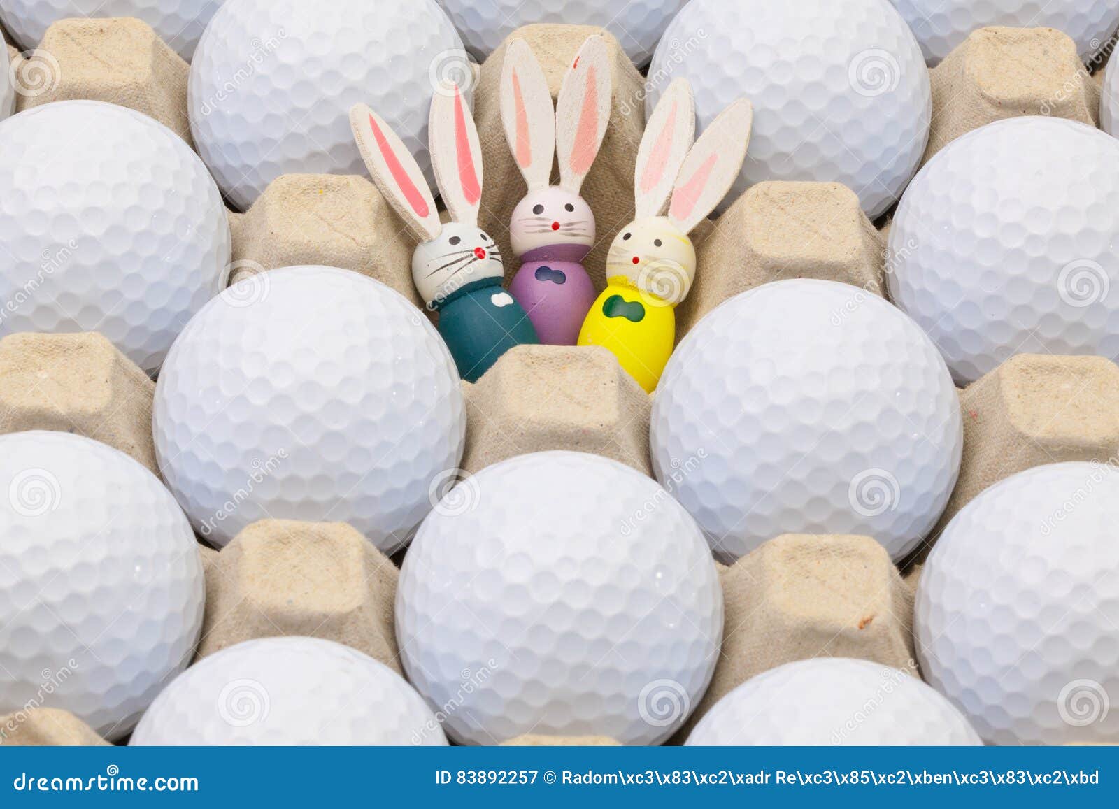 Golf Balls in the Box for Eggs and Easter Decoration Stock Image