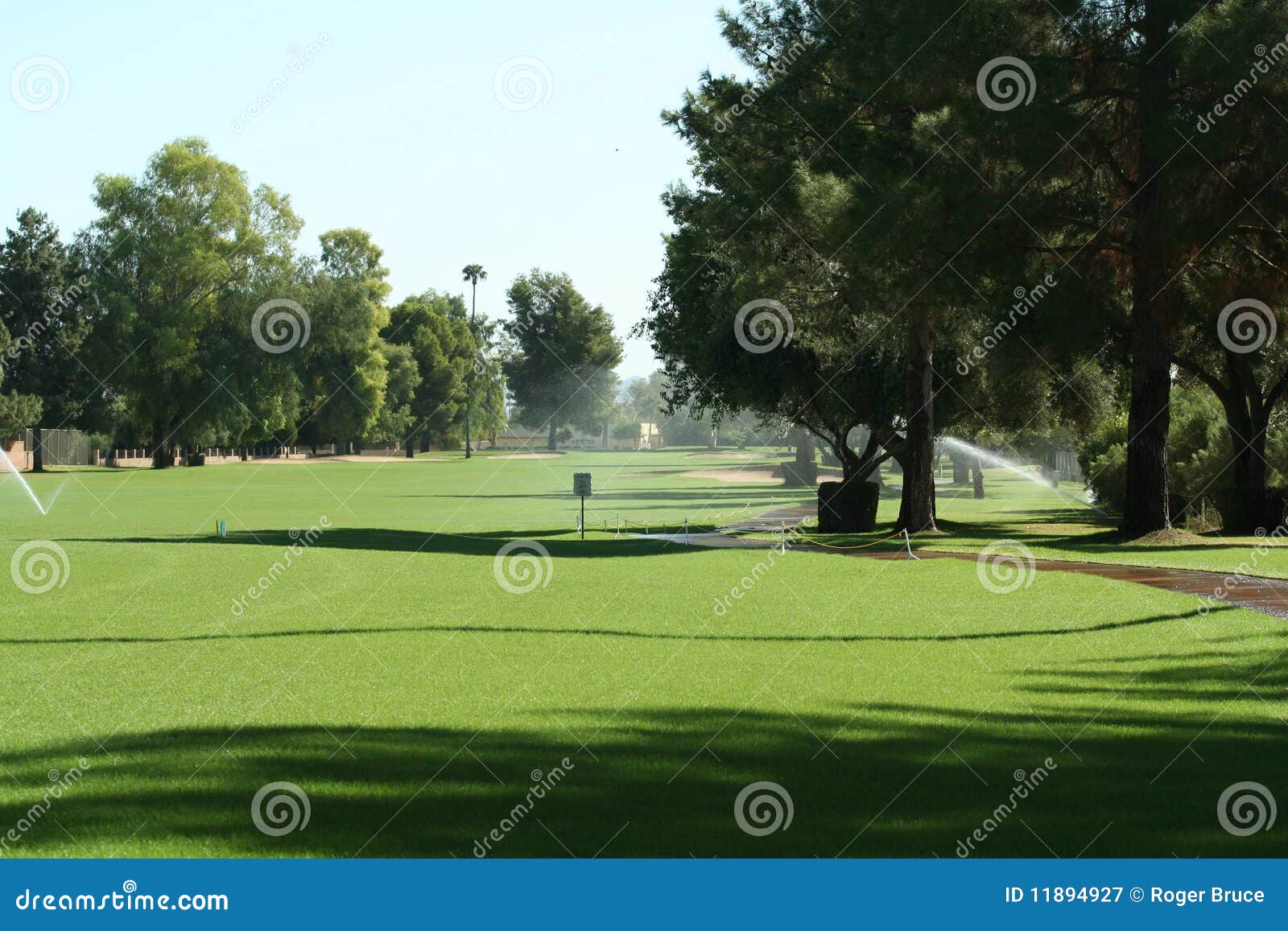Golf Course Fairway with Irrigation. Stock Image Image of grass, sunny 11894927