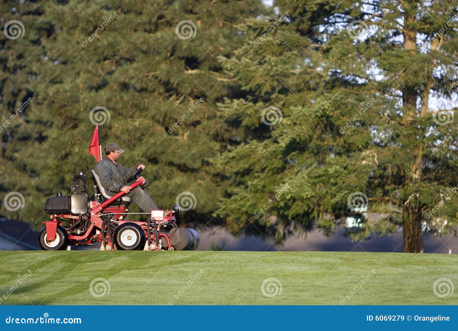 Golf Course Groundskeeper stock image. Image of green 6069279 Golf Course Groundskeeper stock image. Image of green 6069279