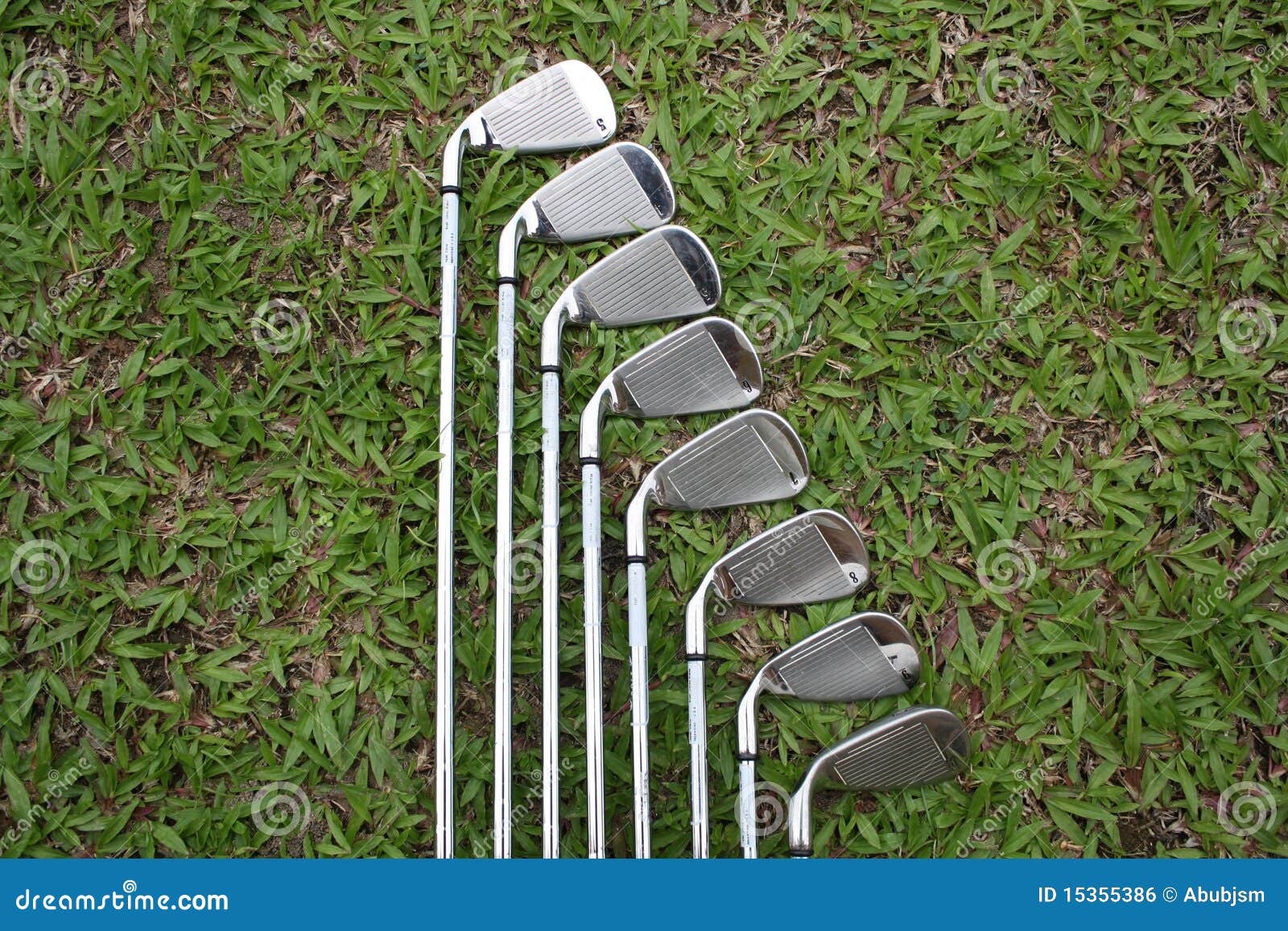 golf irons on the fairway grass