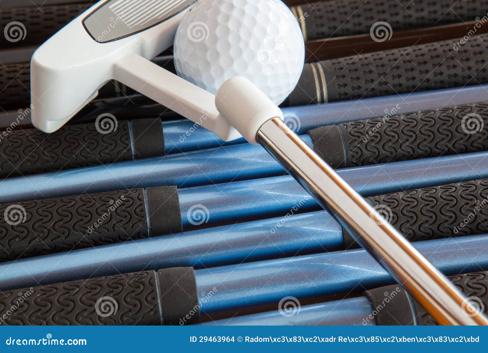 Golf putter and golf clubs stock photo. Image of lawn 29463964